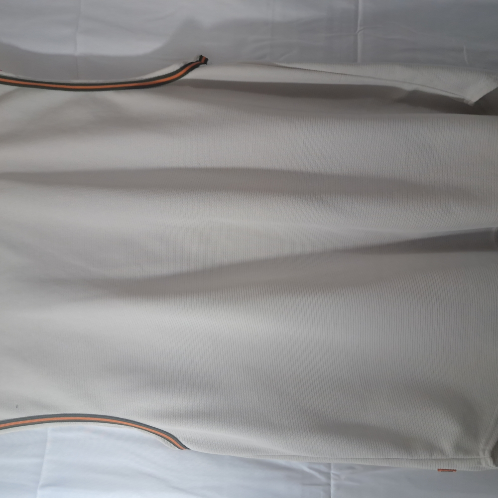 Spalding White Jersey with Green and Orange Trim